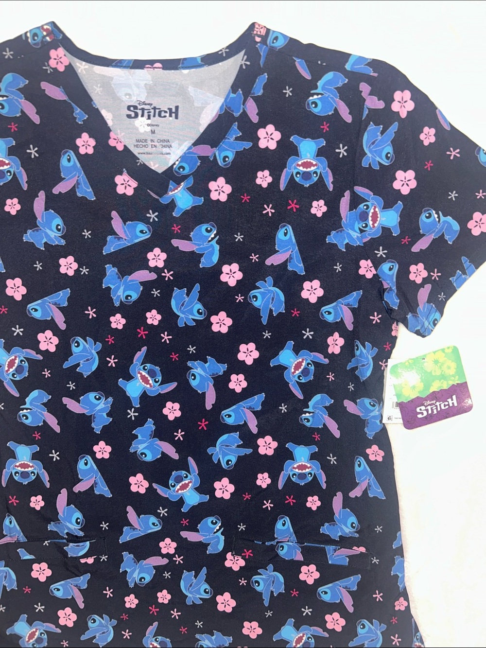 Disney Stitch scrubs top women’s medium new with tags NWT black/blue/pink